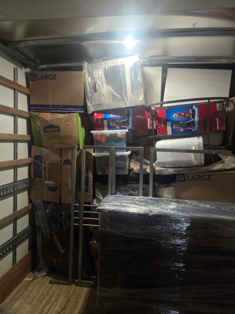 World's Best Movers crew loading furniture efficiently