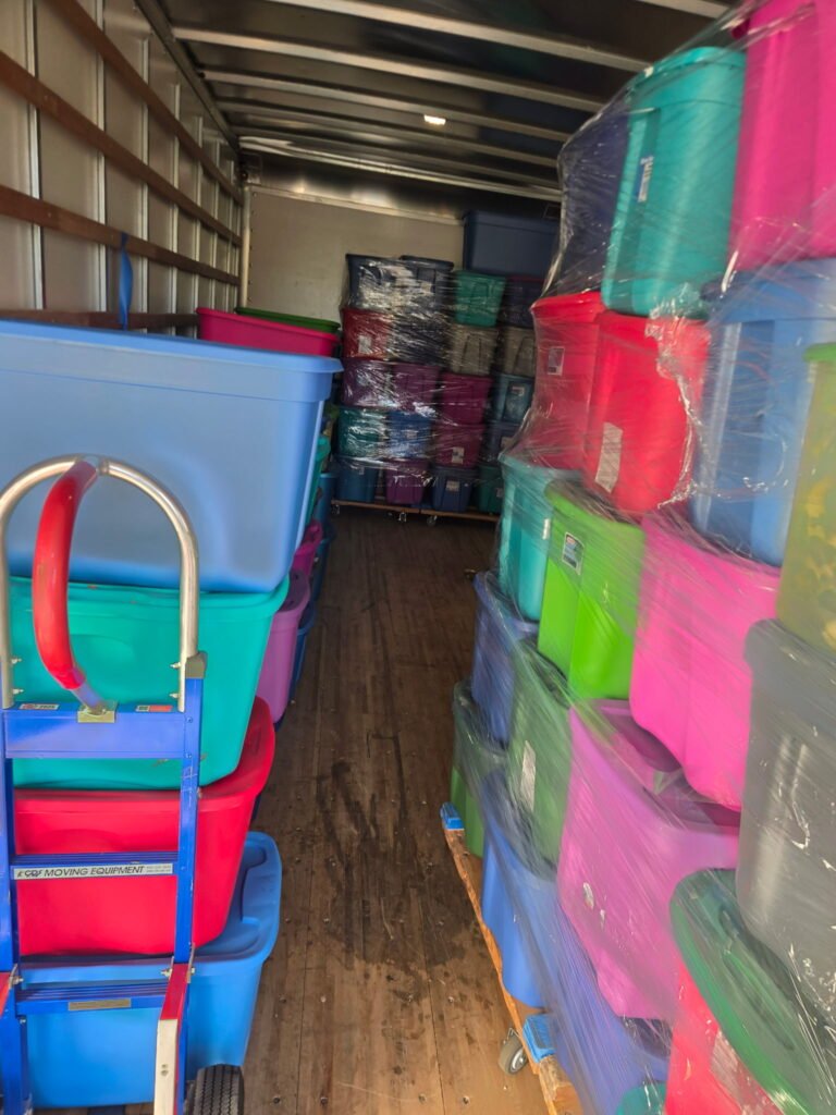 Professional Chicago movers carrying furniture during a move