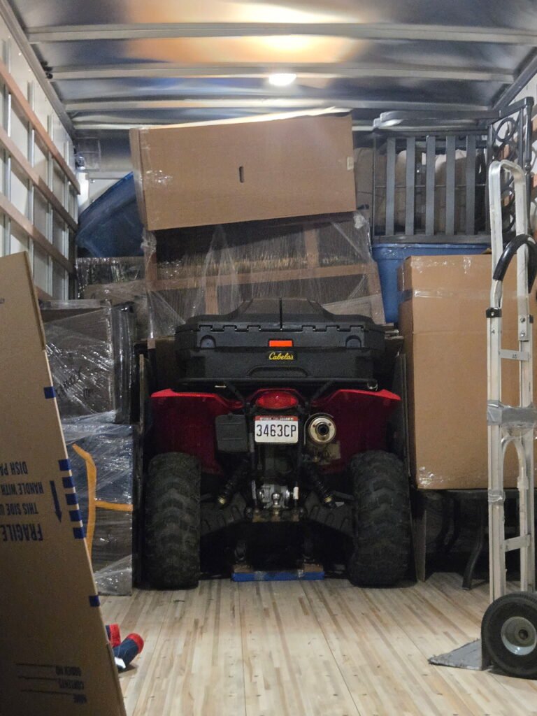 Chicago moving crew securing furniture during loading