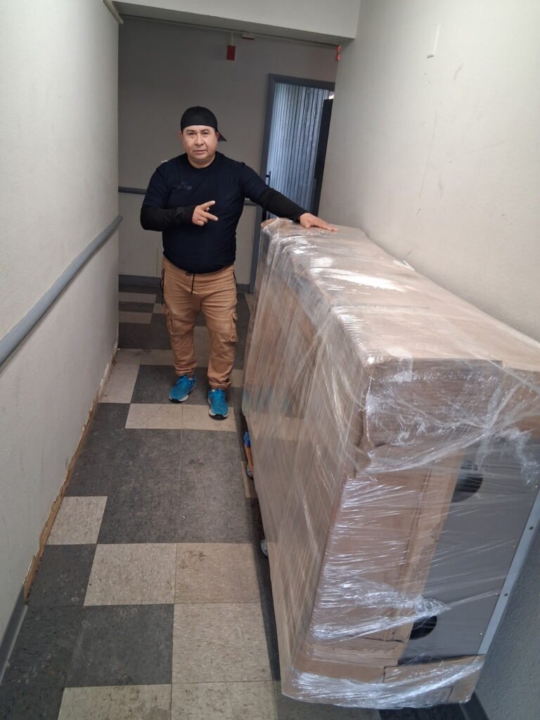 World's Best Movers crew on a moving job